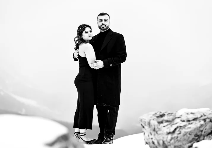Blak and White Engagement Photography of a couple in a hug.