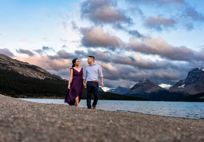 Engagement Photography of the couple walking at Bow Lake