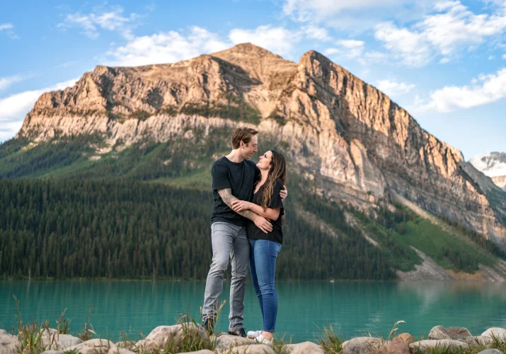 Banff Engagement Photography of the couple in love against a huge mountain