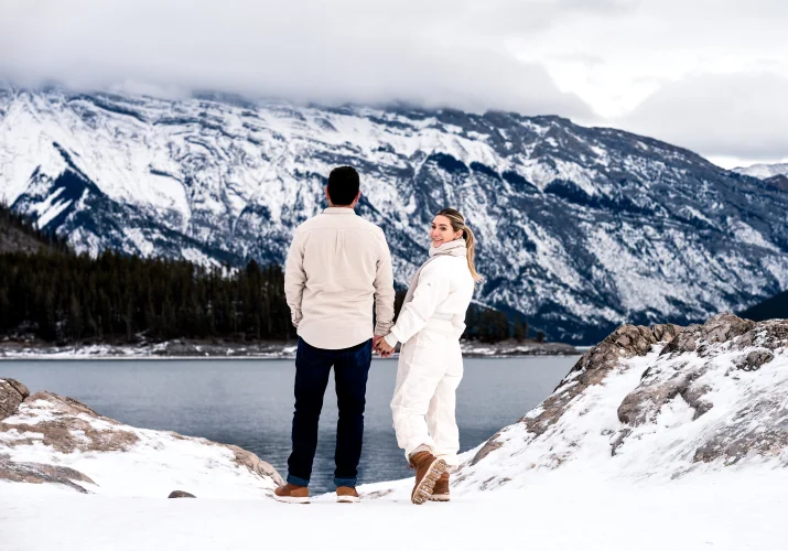 Couple in Love adore the beauty of the Mountains in Banff National Park