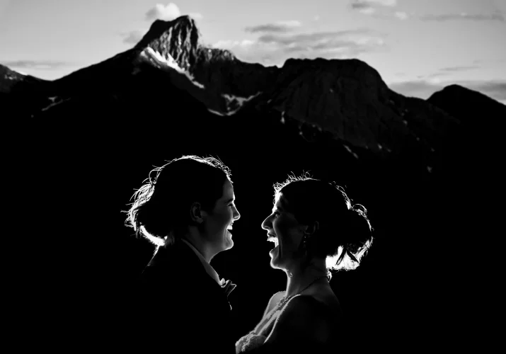 Portrait of two laughing brides