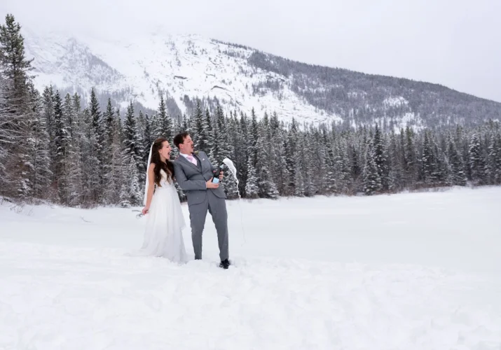 bride and groom celebrating their love at Wedge Pound Kananaskis