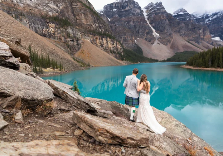 Banff Adventure Wedding Photography with newlyweds at blue Moraine Lake