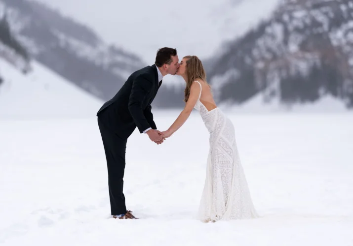 Banff Wedding Photography with kissing newlyweds