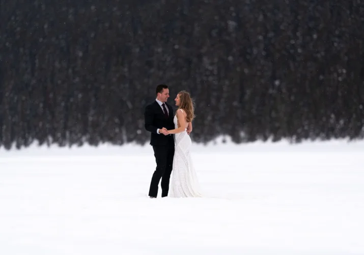 Dancing couple in the snow in Banff