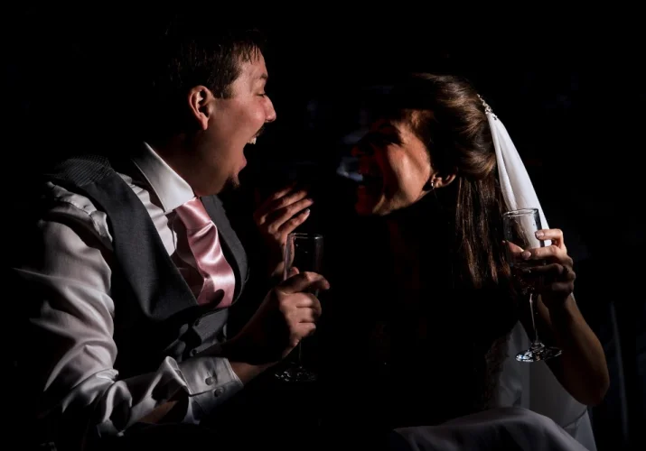 Bride and Groom in the limo with Calgary Wedding Photographer