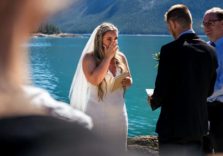 Bride cries during elopement ceremony in Banff