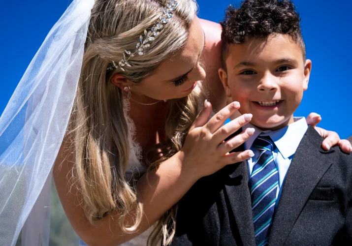 The bride cleans her son face