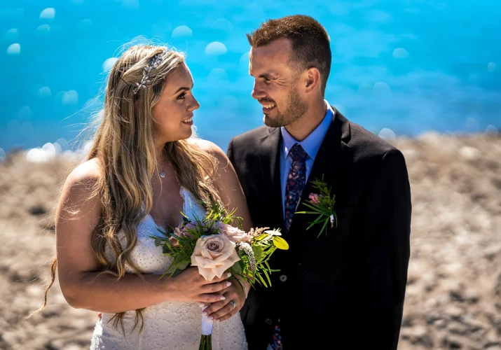bride and groom look at each other during their wedding day