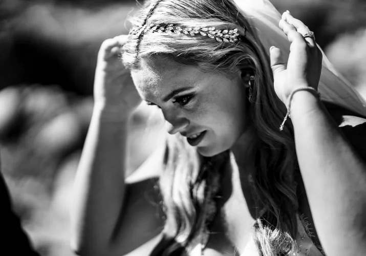 bride fixing her vail