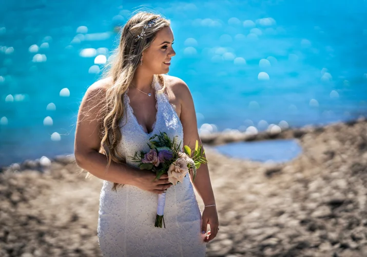 Gorgeous Bride holds her bouquet