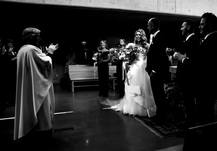 The priest giving a clergy for bride and groom during Calgary wedding Ceremony