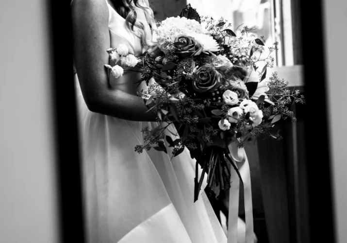 The bride 's looking at the mirror before her Calgary Wedding