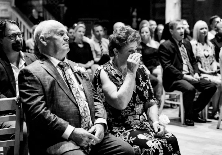 Moved bride's mother is crying during the wedding ceremony in Calgary