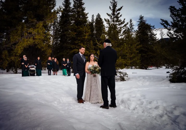 Wedding ceremony in Banff during winter.