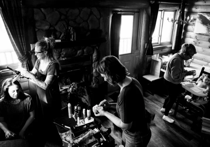 Before the wedding ceremony in the cabin. All ladies are getting ready before Banff elopement.