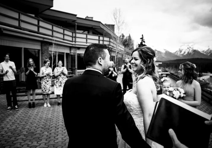 bride and groom look at each other after their Banff Wedding Ceremony. Photo taken in black and white by Banff Wedding Photographers.