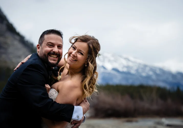 happy newlyweds portrait having fun and smile into camera.