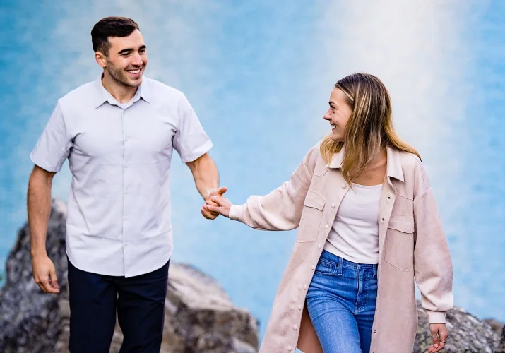 Banff engagement shoot for couple walking hand in hand.