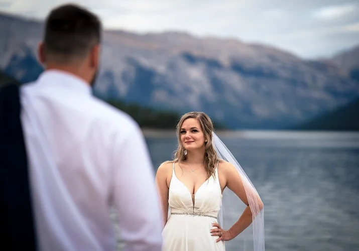 Beautiful bride look at the groom with love.