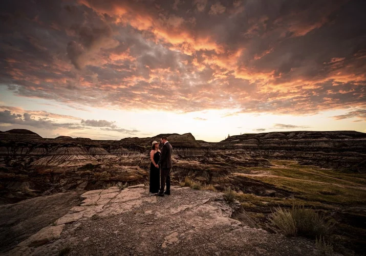 Couple in love holds their hands during their after-wedding session with Calgary Wedding Photographers.