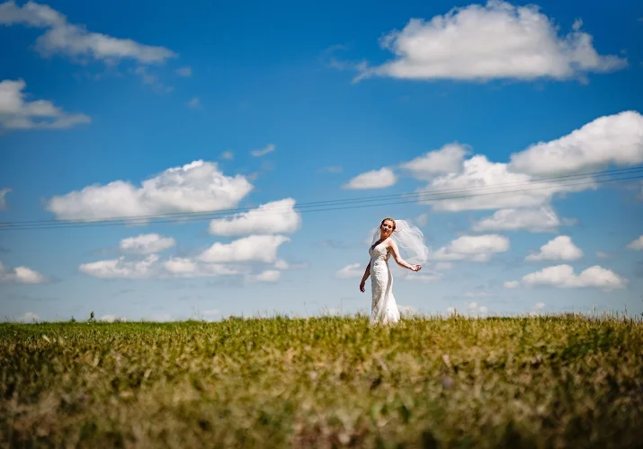 Beautiful bride's portrait on the filed in Calgary.