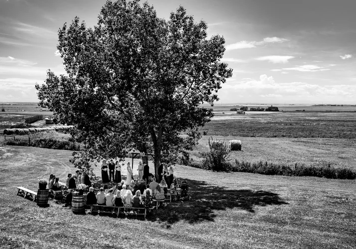 Black and white photograph of the wedding ceremony in the cowboy city of Calgary.