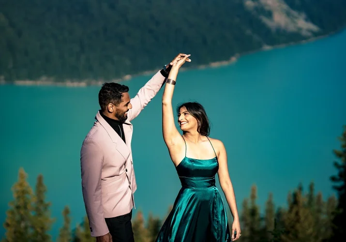 Couple dance by the lake.
