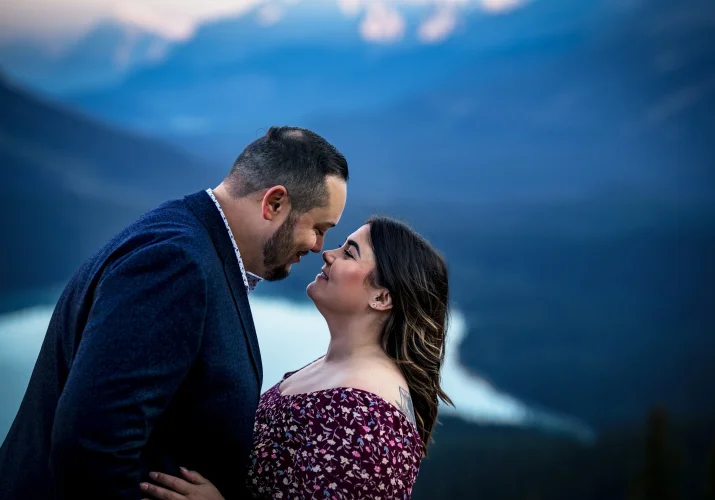 Funny portrait of couple in love touching their noses.