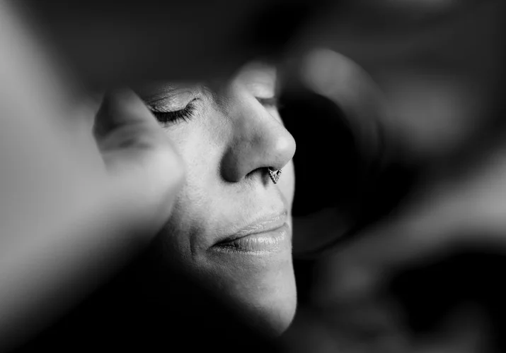 Black and white photograph of the bridesmaid face.