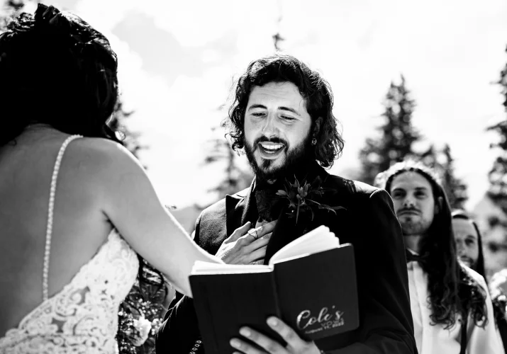 Wedding Photograph in black and white of the groom giving speech dyring Banff Wedding Ceremony.