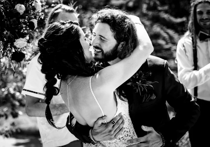 First kiss of newlyweds in Banff.
