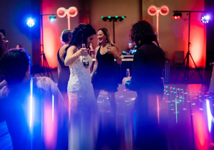 Dance during wedding day with interesting blue lightning.