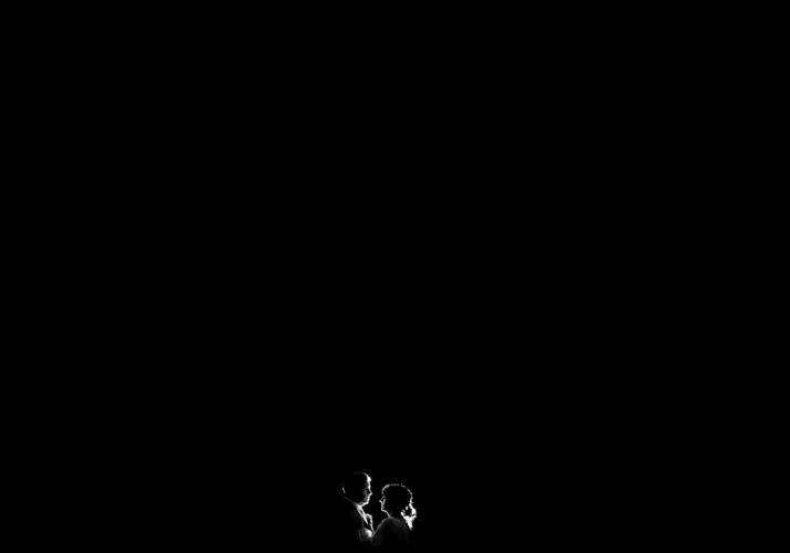 Back-lighted couple in black and white.