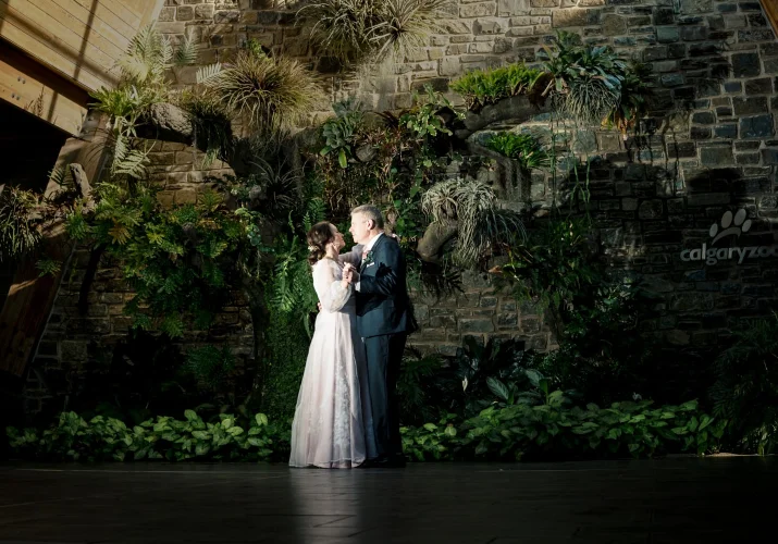 First Dance of bride and groom at Calgary Zoo venue.