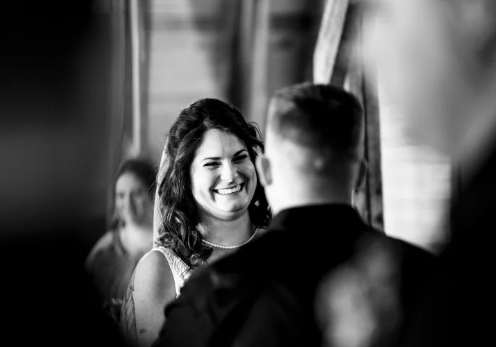 Bride looks and the groom at their Calgary