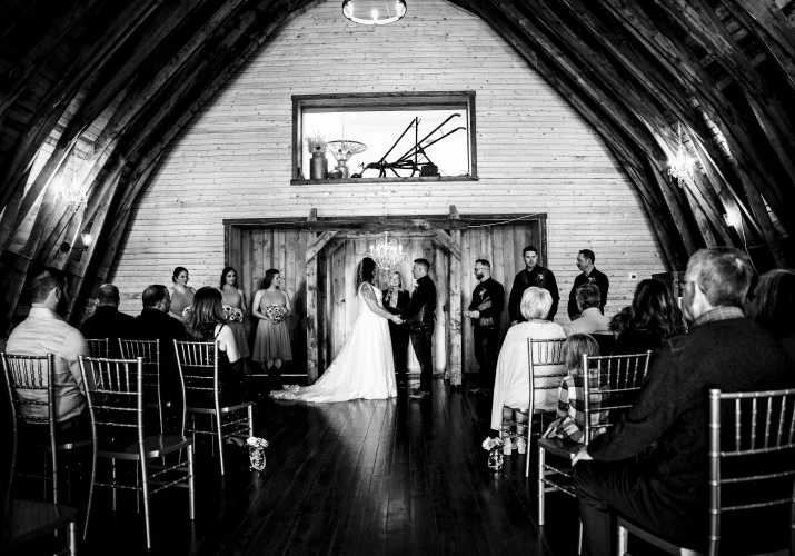 Beautiful Calgary Wedding Ceremony in the rustic shed. Fantastic black and white photography taken by Calgary Wedding Photographer.