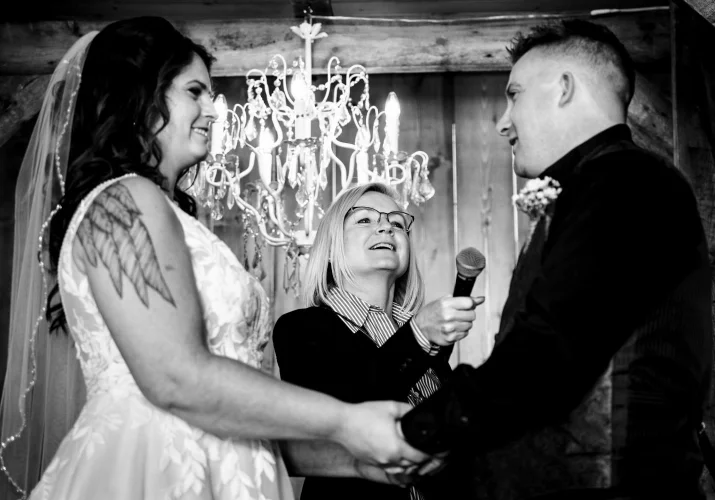 Bride and groom exchange their vows. during Calgary Wedding Ceremony.