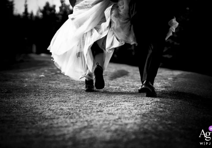 Bride and groom's walking with their hiking boots in Banff