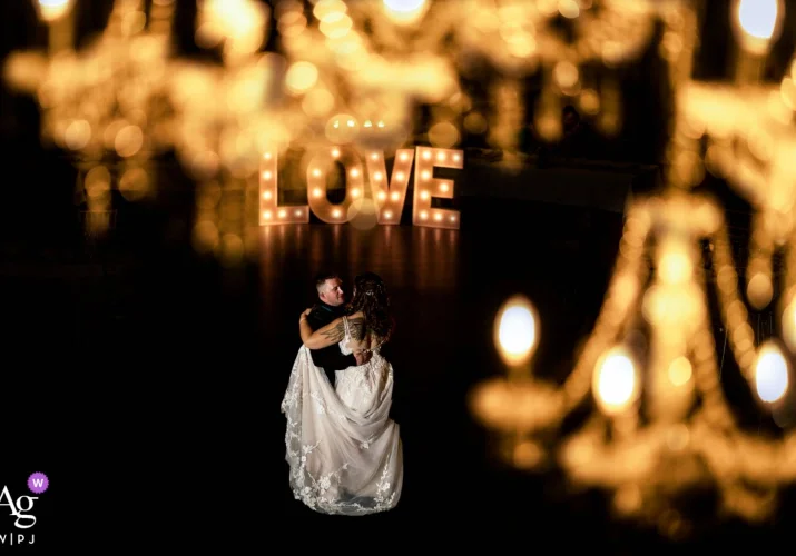 First Dance Through The Chandelier captured by Calgary Wedding Photographer