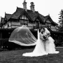 Same sex coupe kissing during their Calgary Wedding